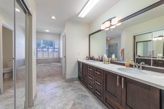 22234 Collington Dr, Boca Raton, FL 33428 - full bath featuring a shower stall, toilet, double vanity, a garden tub, and recessed lighting