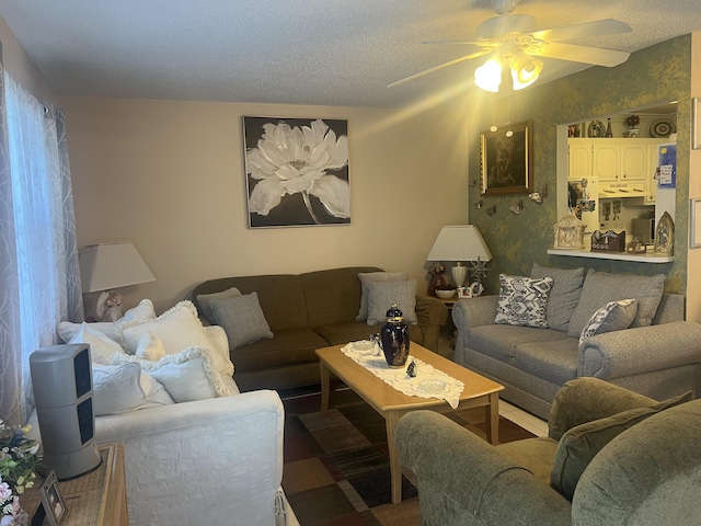 75 Flanders B B, Delray Beach, FL 33484 - living area with a textured ceiling and a ceiling fan
