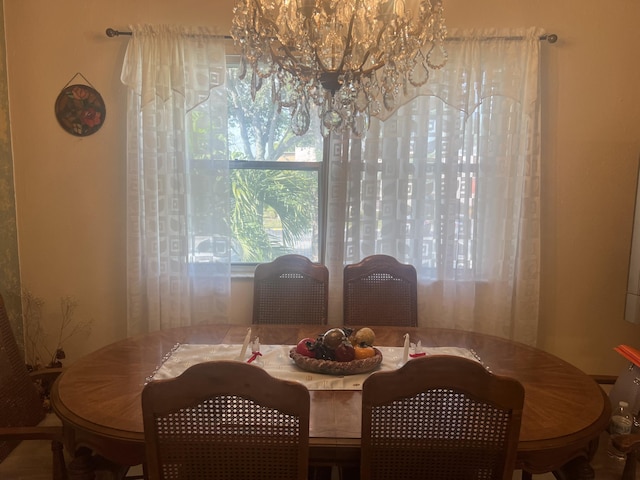 75 Flanders B B, Delray Beach, FL 33484 - dining area featuring a notable chandelier