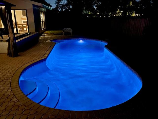 2211 NE 34th Ct, Lighthouse Point, FL 33064 - view of pool featuring a fenced in pool, a fenced backyard, and a patio area