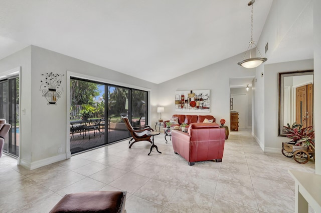 2211 NE 34th Ct, Lighthouse Point, FL 33064 - living room featuring baseboards, light tile patterned flooring, high vaulted ceiling, and visible vents