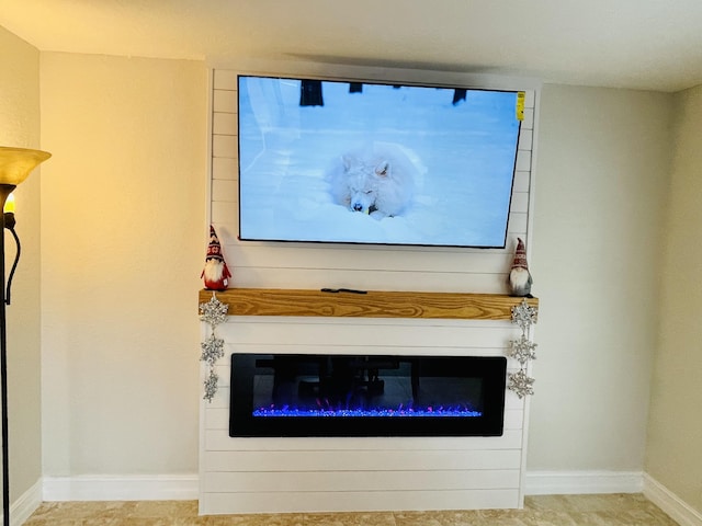 2211 NE 34th Ct, Lighthouse Point, FL 33064 - interior details with baseboards and a large fireplace