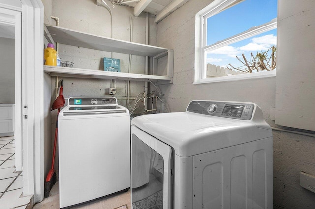 laundry area featuring washer and dryer and laundry area
