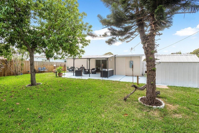 view of yard featuring a fenced backyard and a patio area