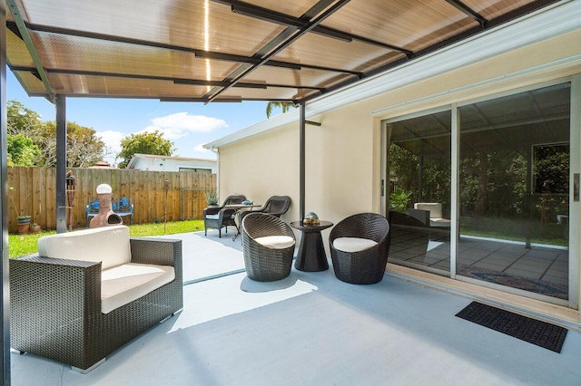 view of patio / terrace with fence