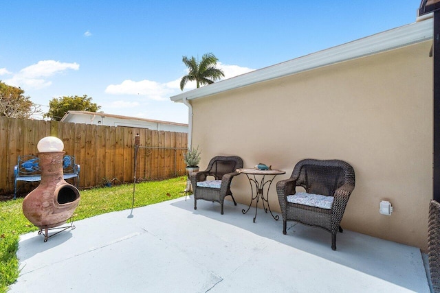 view of patio with fence