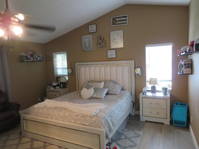 5372 Pine Cir, Coral Springs, FL 33067 - bedroom with vaulted ceiling, light wood finished floors, baseboards, and a ceiling fan