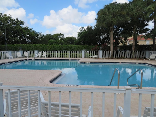 5372 Pine Cir, Coral Springs, FL 33067 - community pool featuring a patio