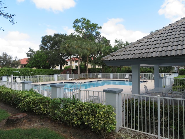 5372 Pine Cir, Coral Springs, FL 33067 - community pool featuring a gazebo and a patio