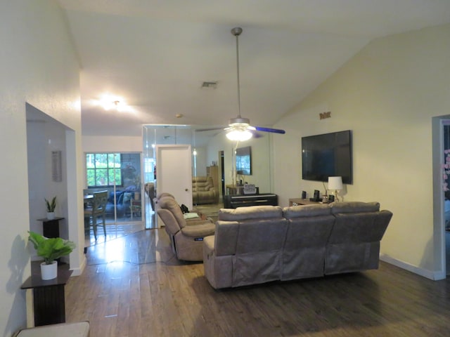 5372 Pine Cir, Coral Springs, FL 33067 - living area with dark wood-style floors, ceiling fan, baseboards, and high vaulted ceiling