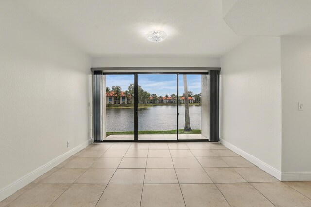 1520 Windorah B Way Unit B, West Palm Beach, FL 33411 - kitchen with visible vents, dark stone counters, stainless steel appliances, and a sink