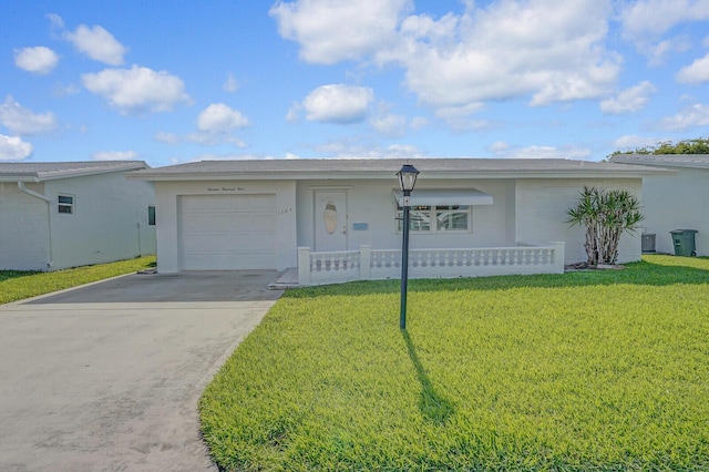 1304 SW 23rd St, Boynton Beach, FL 33426 - single story home featuring a garage, a front yard, driveway, and stucco siding