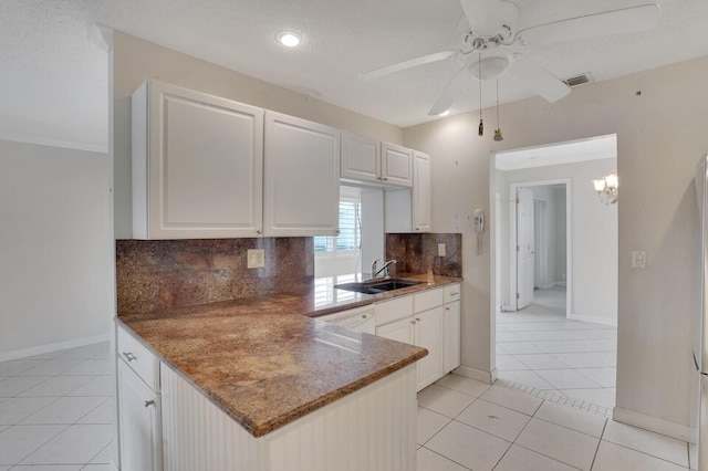 1304 SW 23rd St, Boynton Beach, FL 33426 - kitchen featuring a sink, tasteful backsplash, light tile patterned floors, a ceiling fan, and recessed lighting