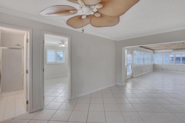 1304 SW 23rd St, Boynton Beach, FL 33426 - unfurnished room with ornamental molding, light tile patterned floors, a ceiling fan, and baseboards