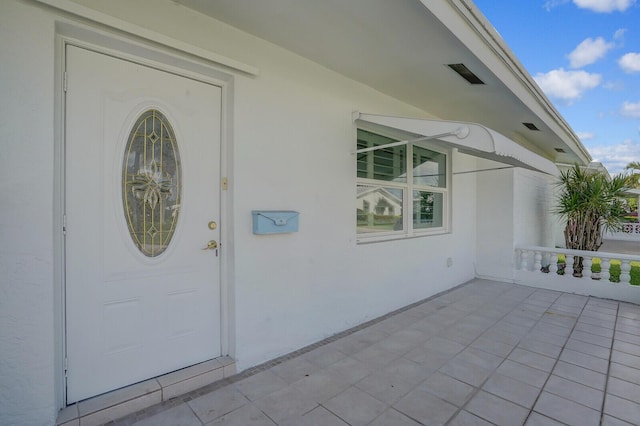 1304 SW 23rd St, Boynton Beach, FL 33426 - property entrance with stucco siding