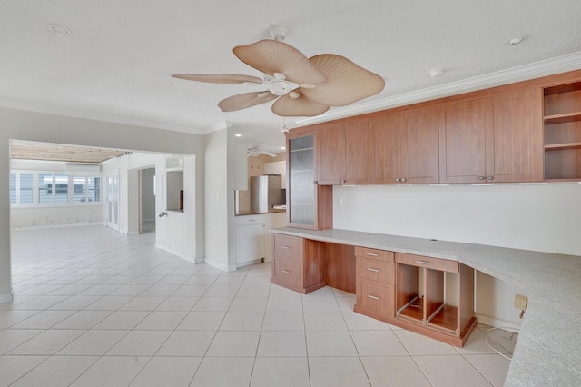 1304 SW 23rd St, Boynton Beach, FL 33426 - kitchen featuring open shelves, crown molding, brown cabinetry, glass insert cabinets, and light countertops