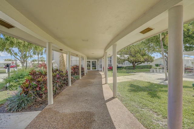 1304 SW 23rd St, Boynton Beach, FL 33426 - view of patio / terrace featuring french doors