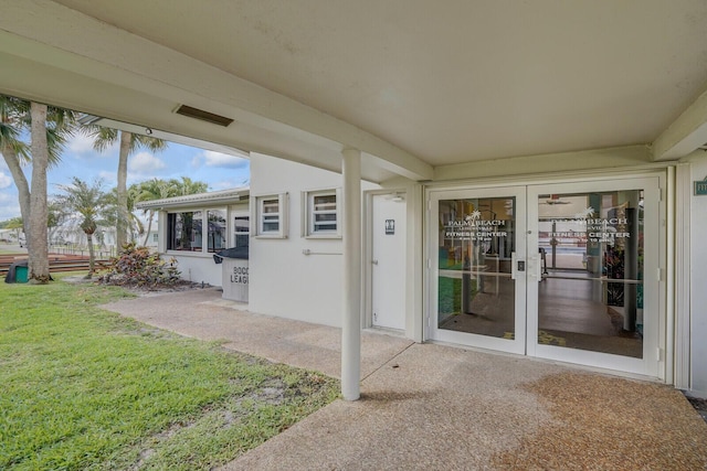 1304 SW 23rd St, Boynton Beach, FL 33426 - unfurnished sunroom with french doors