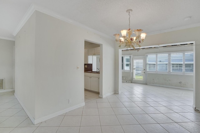 1304 SW 23rd St, Boynton Beach, FL 33426 - spare room with ornamental molding, a chandelier, light tile patterned flooring, and baseboards