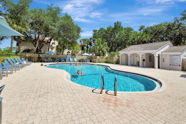 5115 Europa Dr Unit P, Boynton Beach, FL 33437 - community pool with fence and a patio area
