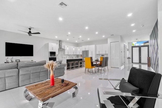 15744 68th Ct N, The Acreage, FL 33470 - living room featuring french doors, a ceiling fan, visible vents, and recessed lighting