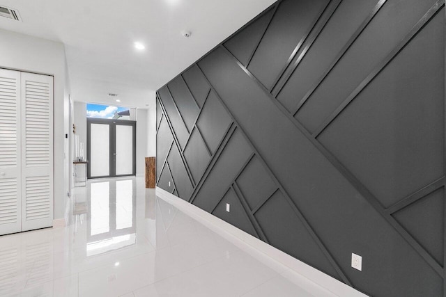 15744 68th Ct N, The Acreage, FL 33470 - hallway with recessed lighting, a decorative wall, visible vents, and light tile patterned flooring