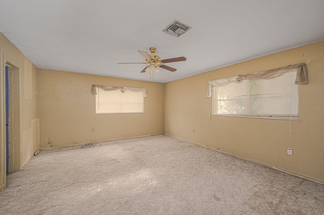 2008 Avenue Ave N, Fort Pierce, FL 34950 - carpeted empty room featuring visible vents, baseboards, and ceiling fan