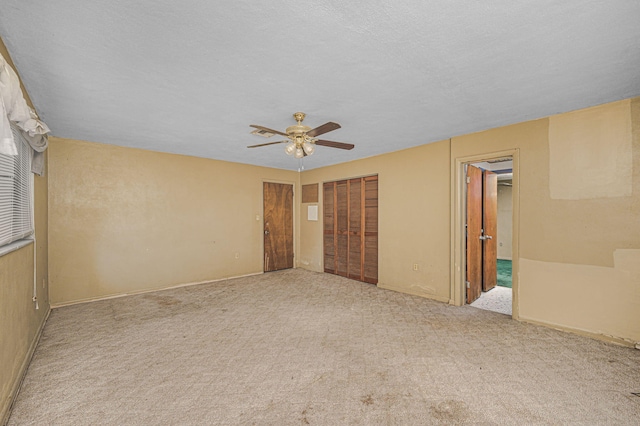 2008 Avenue Ave N, Fort Pierce, FL 34950 - unfurnished bedroom with baseboards, a ceiling fan, and carpet floors