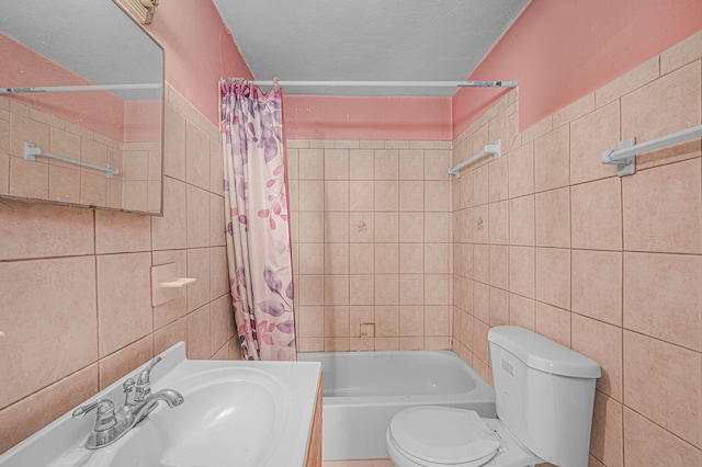 2008 Avenue Ave N, Fort Pierce, FL 34950 - full bathroom featuring shower / tub combo, tile walls, a sink, and toilet