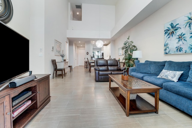 9339 World Cup Way, Port Saint Lucie, FL 34986 - living area with a high ceiling and recessed lighting