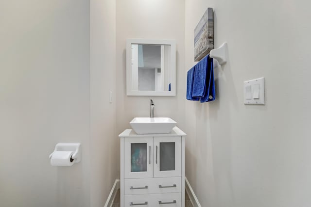 9339 World Cup Way, Port Saint Lucie, FL 34986 - half bathroom featuring baseboards and vanity