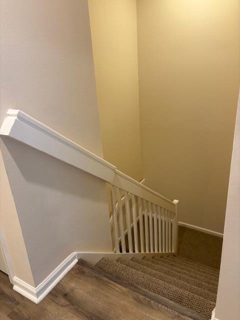 9339 World Cup Way, Port Saint Lucie, FL 34986 - staircase with baseboards and wood finished floors