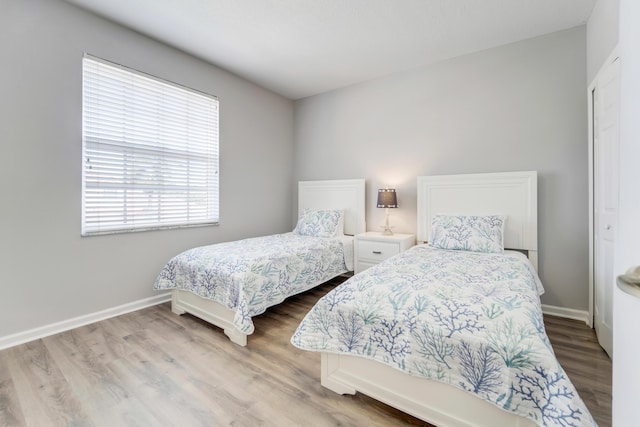 9339 World Cup Way, Port Saint Lucie, FL 34986 - bedroom featuring wood finished floors and baseboards