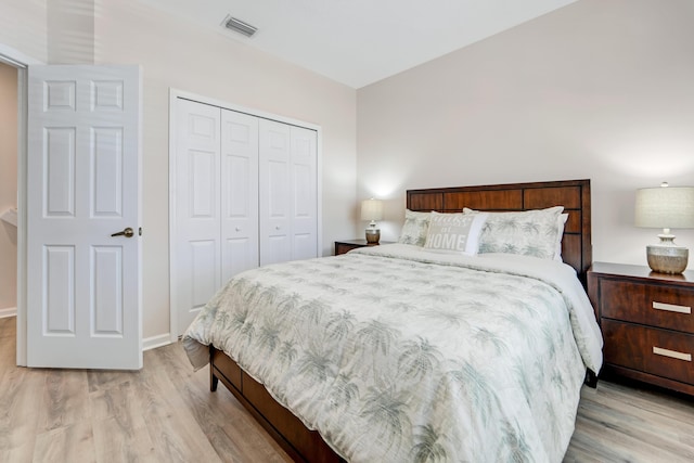 9339 World Cup Way, Port Saint Lucie, FL 34986 - bedroom with light wood-style flooring, a closet, and baseboards
