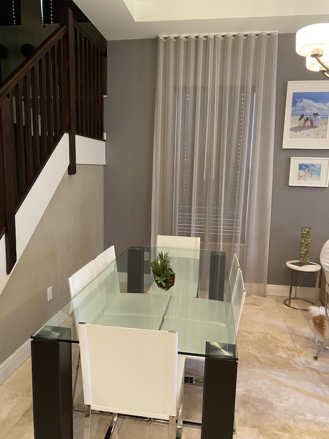 8481 NW 51st Ter, Doral, FL 33166 - dining area with tile patterned flooring and baseboards