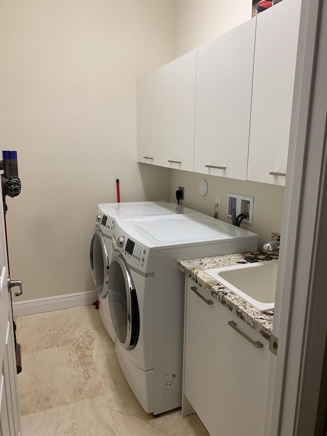 8481 NW 51st Ter, Doral, FL 33166 - washroom with independent washer and dryer, a sink, cabinet space, and baseboards