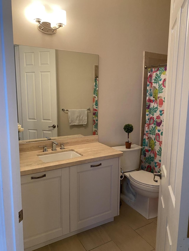 8481 NW 51st Ter, Doral, FL 33166 - full bath featuring toilet, vanity, and tile patterned floors