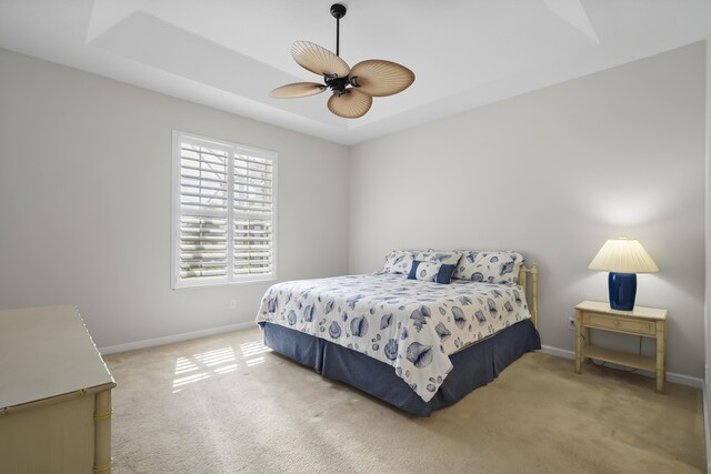 551 NW Red Pine Way, Jensen Beach, FL 34957 - bedroom with carpet floors and ceiling fan