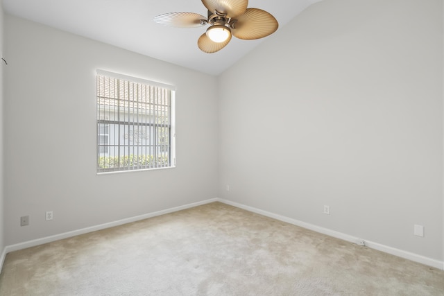 551 NW Red Pine Way, Jensen Beach, FL 34957 - empty room featuring ceiling fan, light carpet, and vaulted ceiling