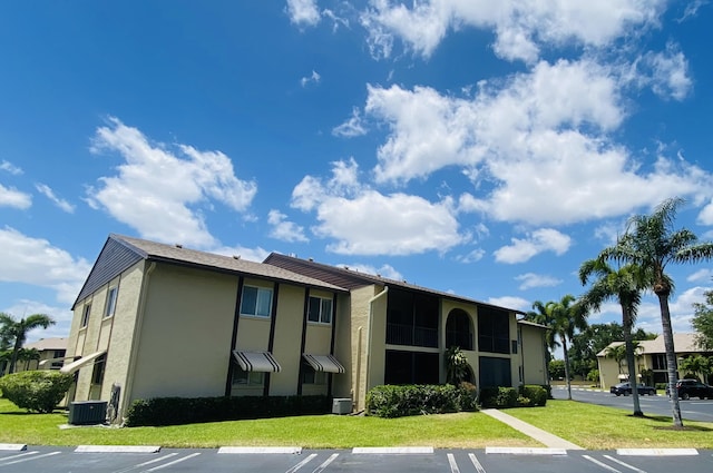 334 Pine Ridge Cir Unit D-2, Greenacres, FL 33463 - view of property with uncovered parking