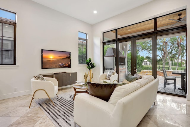 9387 Satinleaf Pl, Parkland, FL 33076 - living area with recessed lighting, marble finish floor, and baseboards