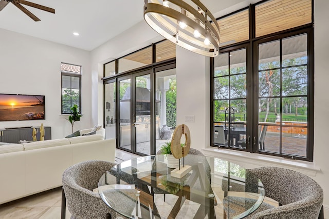 9387 Satinleaf Pl, Parkland, FL 33076 - tiled dining room featuring recessed lighting, a ceiling fan, and plenty of natural light