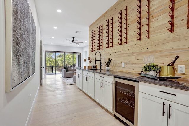 9387 Satinleaf Pl, Parkland, FL 33076 - bar featuring visible vents, beverage cooler, recessed lighting, and a sink