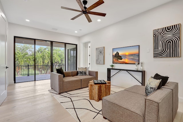9387 Satinleaf Pl, Parkland, FL 33076 - living room featuring recessed lighting, a ceiling fan, light wood-style flooring, and baseboards