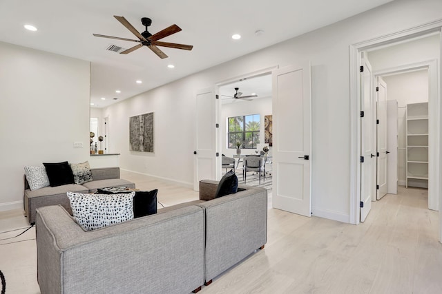 9387 Satinleaf Pl, Parkland, FL 33076 - living room with recessed lighting, ceiling fan, and light wood finished floors