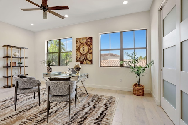 9387 Satinleaf Pl, Parkland, FL 33076 - home office featuring recessed lighting, ceiling fan, baseboards, and light wood-type flooring