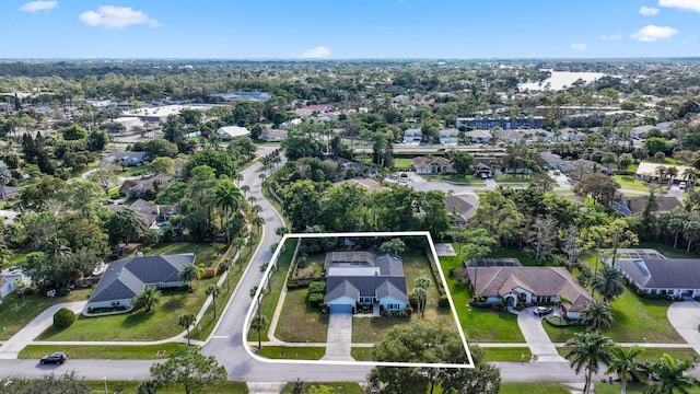aerial view of residential area featuring property boundaries highlighted