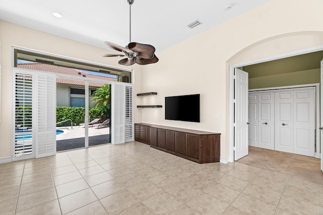 6346 San Michel Way, Delray Beach, FL 33484 - unfurnished living room featuring light tile patterned flooring, visible vents, baseboards, and ceiling fan