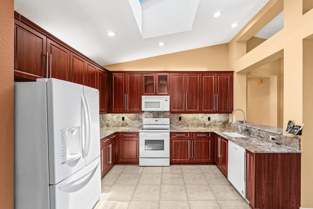 6346 San Michel Way, Delray Beach, FL 33484 - kitchen with light tile patterned floors, a sink, white appliances, light stone countertops, and tasteful backsplash