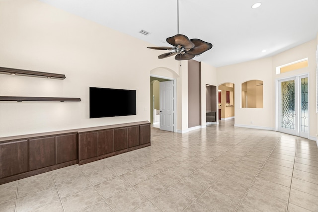 6346 San Michel Way, Delray Beach, FL 33484 - unfurnished living room featuring a ceiling fan, arched walkways, recessed lighting, and baseboards